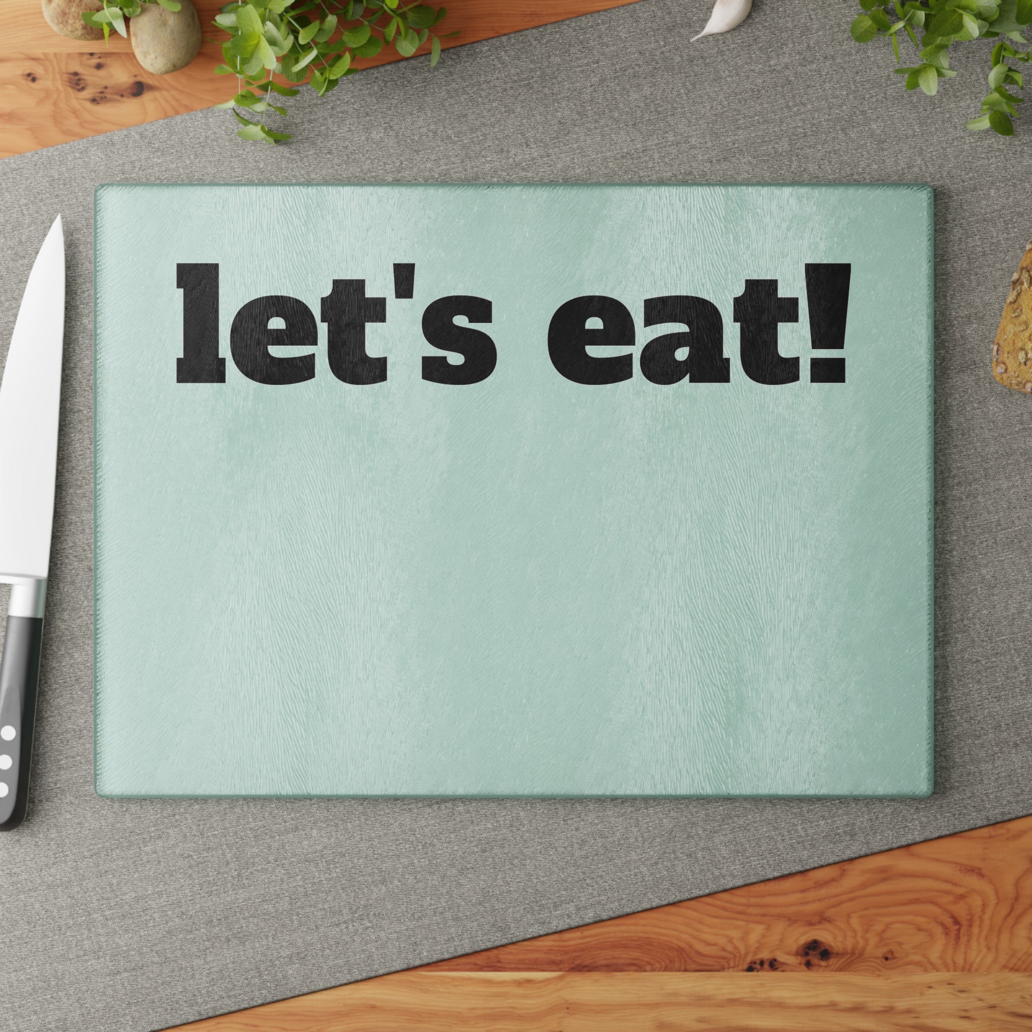 let's eat! Glass Cutting Board | Mint background, Bold black text